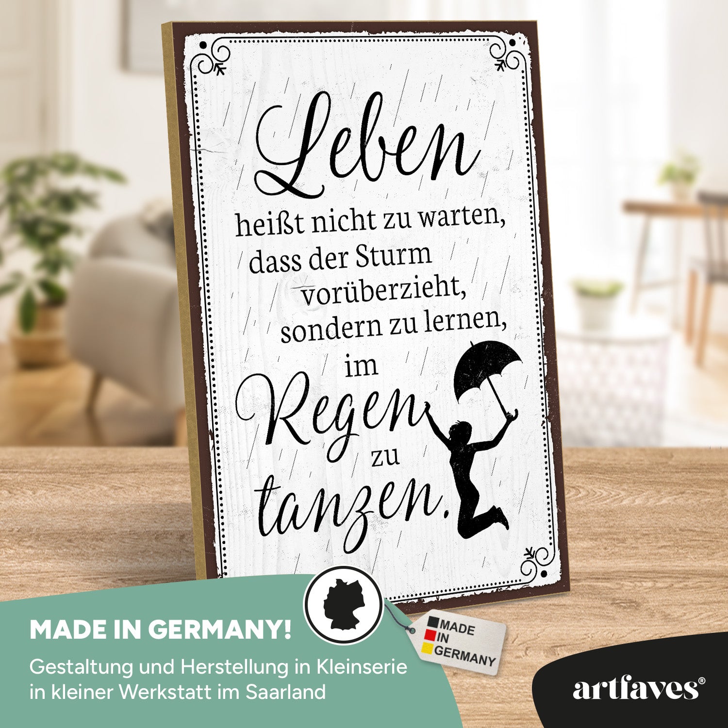 schild-mit-spruch-leben-heisst-tanzen-im-regen