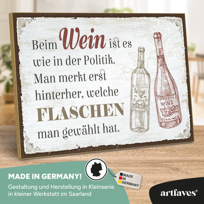 schild-mit-spruch-beim-wein-ist-es-wie-in-der-politik