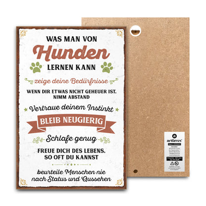 schild-mit-spruch-was-man-von-hunden-lernen-kann