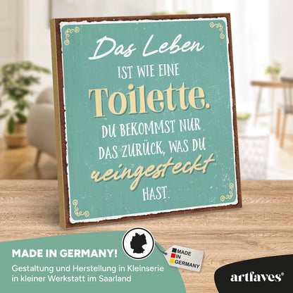 schild-mit-spruch-das-leben-ist-wie-eine-toilette
