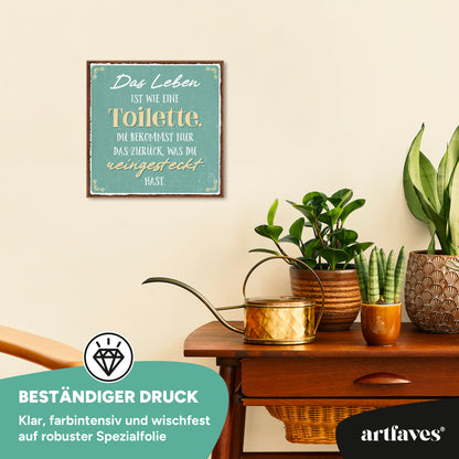schild-mit-spruch-das-leben-ist-wie-eine-toilette