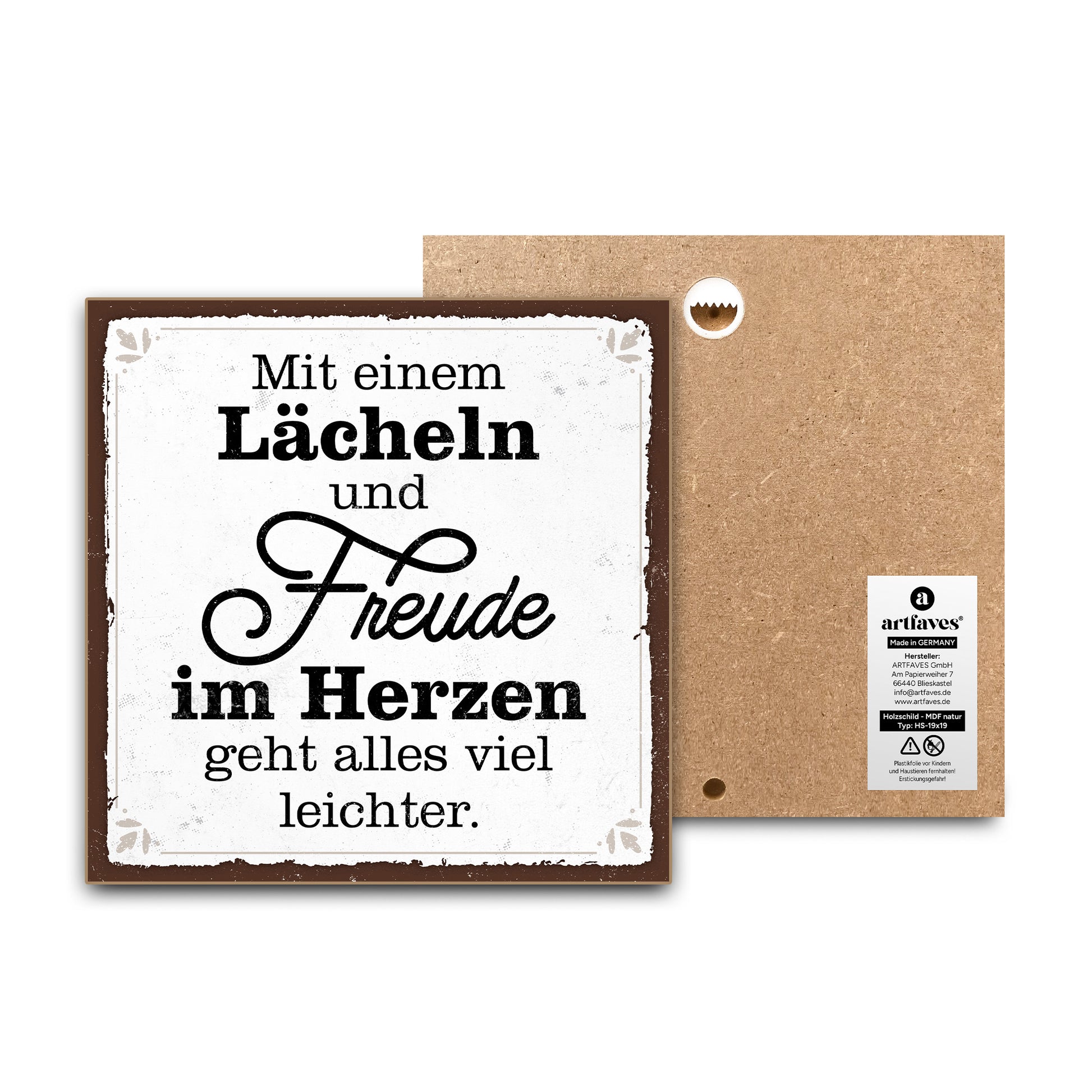 schild-mit-spruch-mit-lächeln-und-freude-im-herzen
