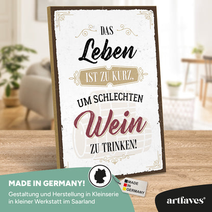 schild-mit-spruch-das-leben-ist-zu-kurz-um-schlechten-wein-zu-trinken
