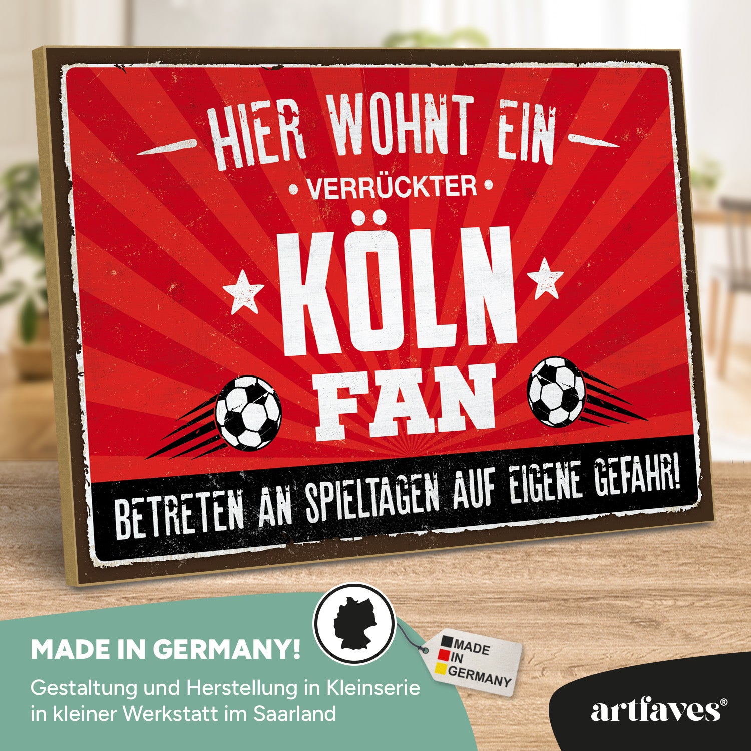 schild-mit-spruch-hier-wohnt-ein-verrueckter-köln-fan