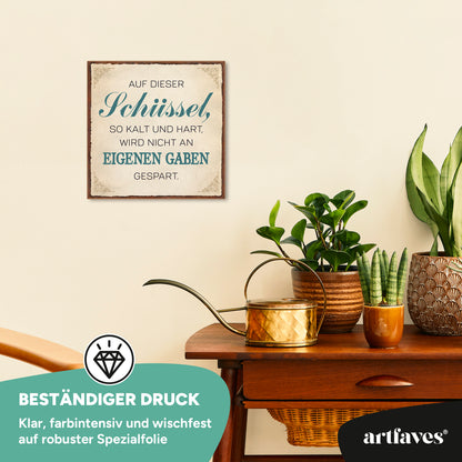schild-mit-spruch-auf-dieser-schuessel