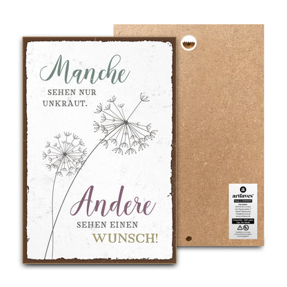 schild-mit-spruch-manche-sehen-nur-unkraut