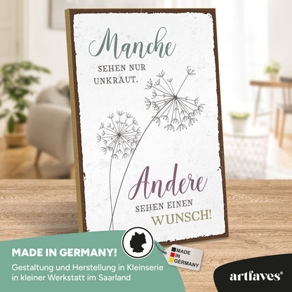 schild-mit-spruch-manche-sehen-nur-unkraut