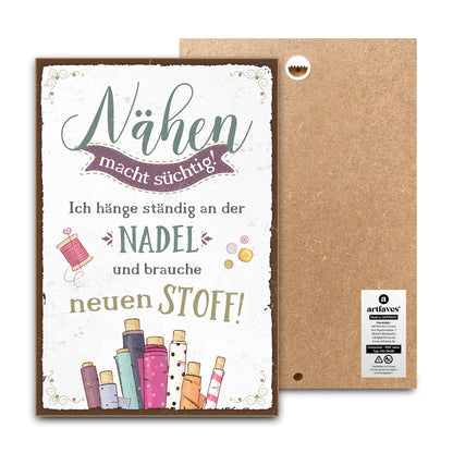 schild-mit-spruch-naehen-macht-suechtig