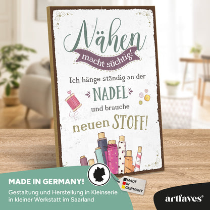schild-mit-spruch-naehen-macht-suechtig