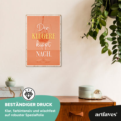 schild-mit-spruch-der-kluegere-kippt-nach