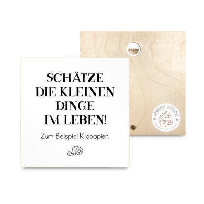 holzbild-mit-spruch-schaetze-die-kleinen-dinge-im-leben-klopapier